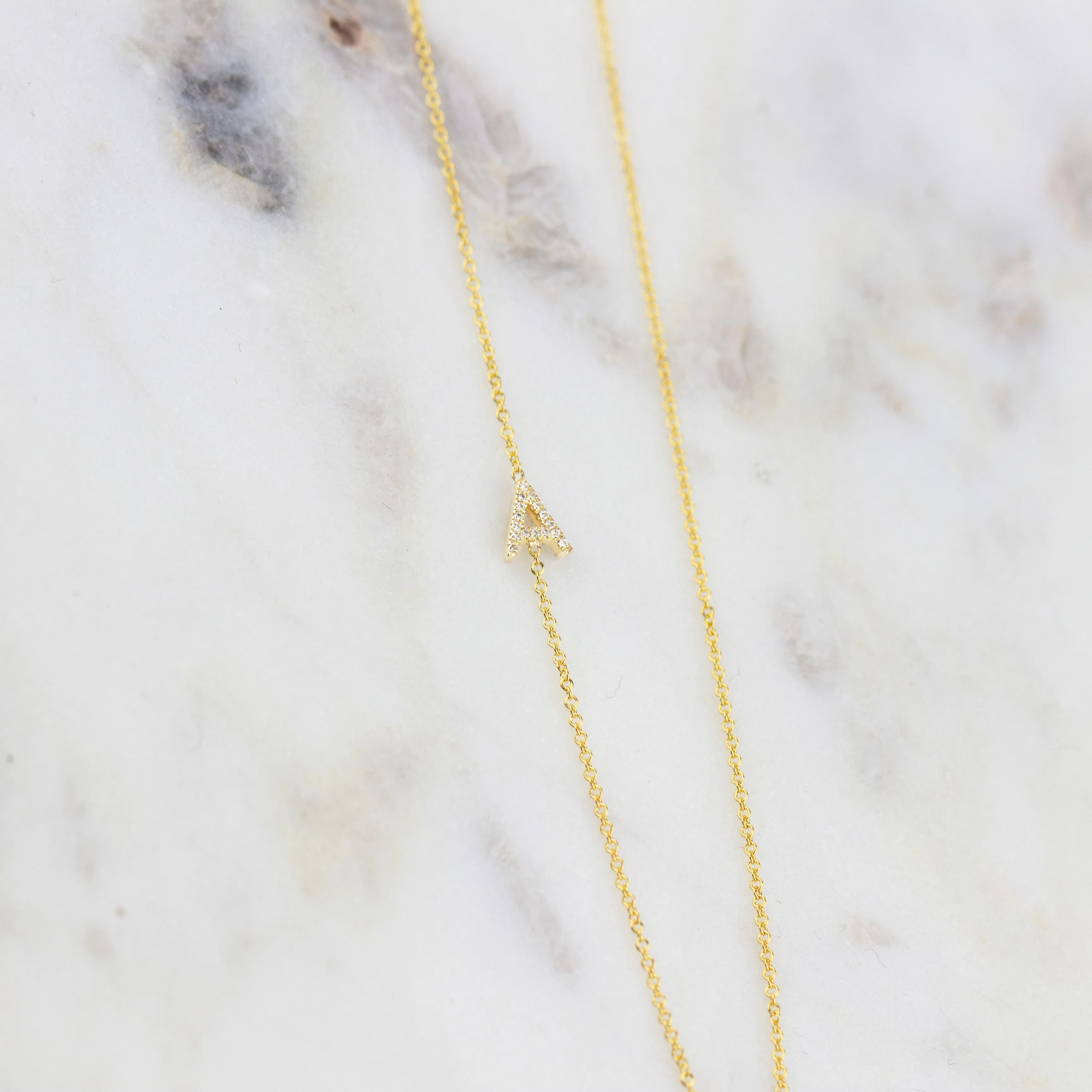 14K GOLD ASYMMETRICAL LETTER NECKLACE - A