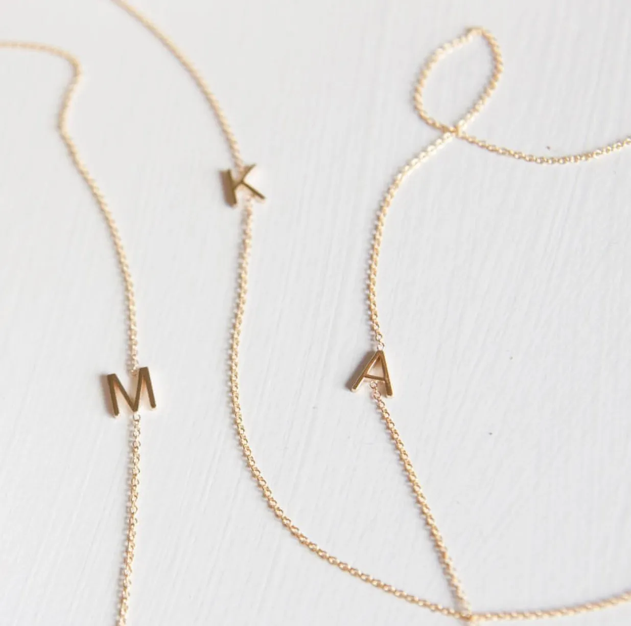 14K GOLD ASYMMETRICAL LETTER NECKLACE - A