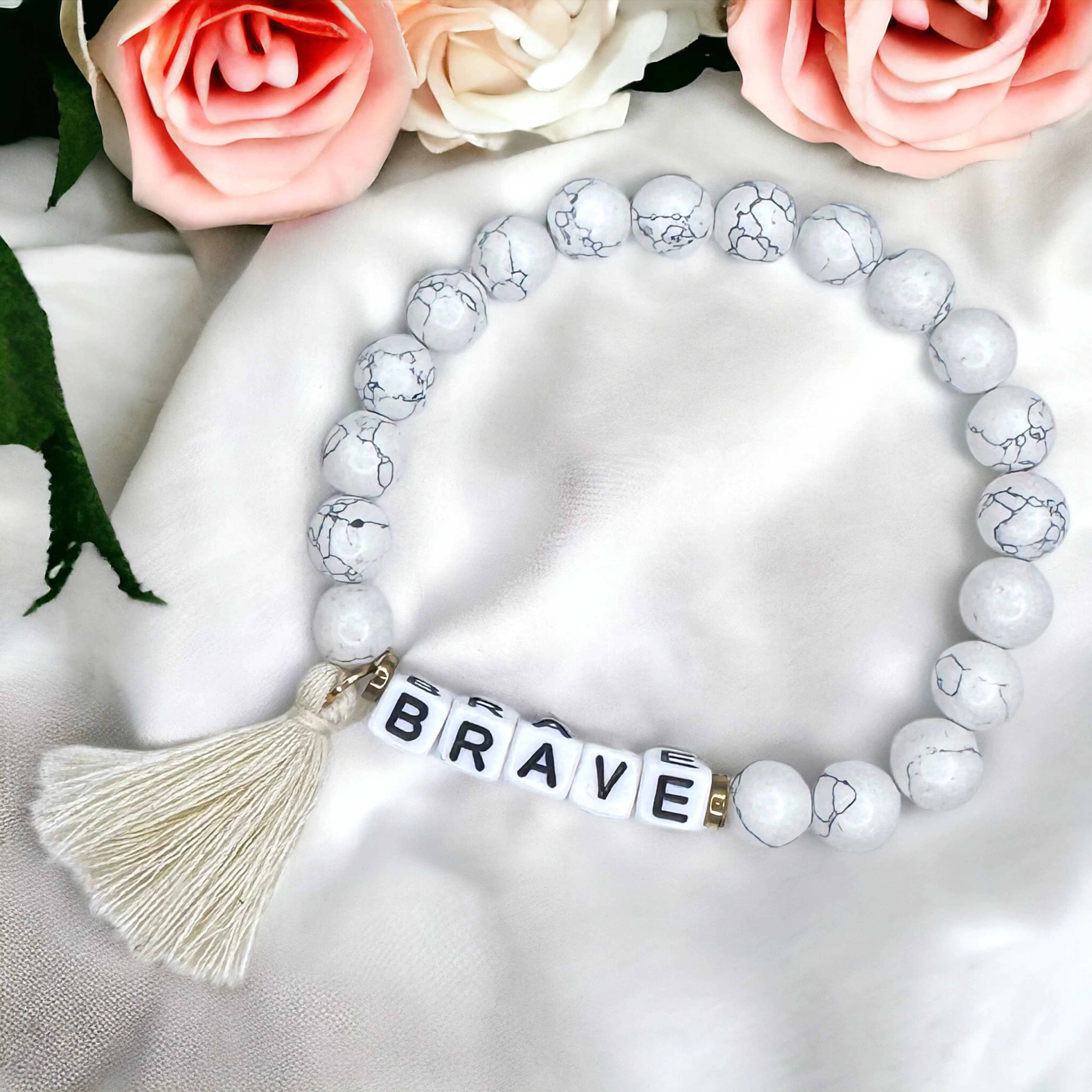 Brand New Tassel Charm “Brave” Beaded Bracelet – Your New Favorite Accessory!